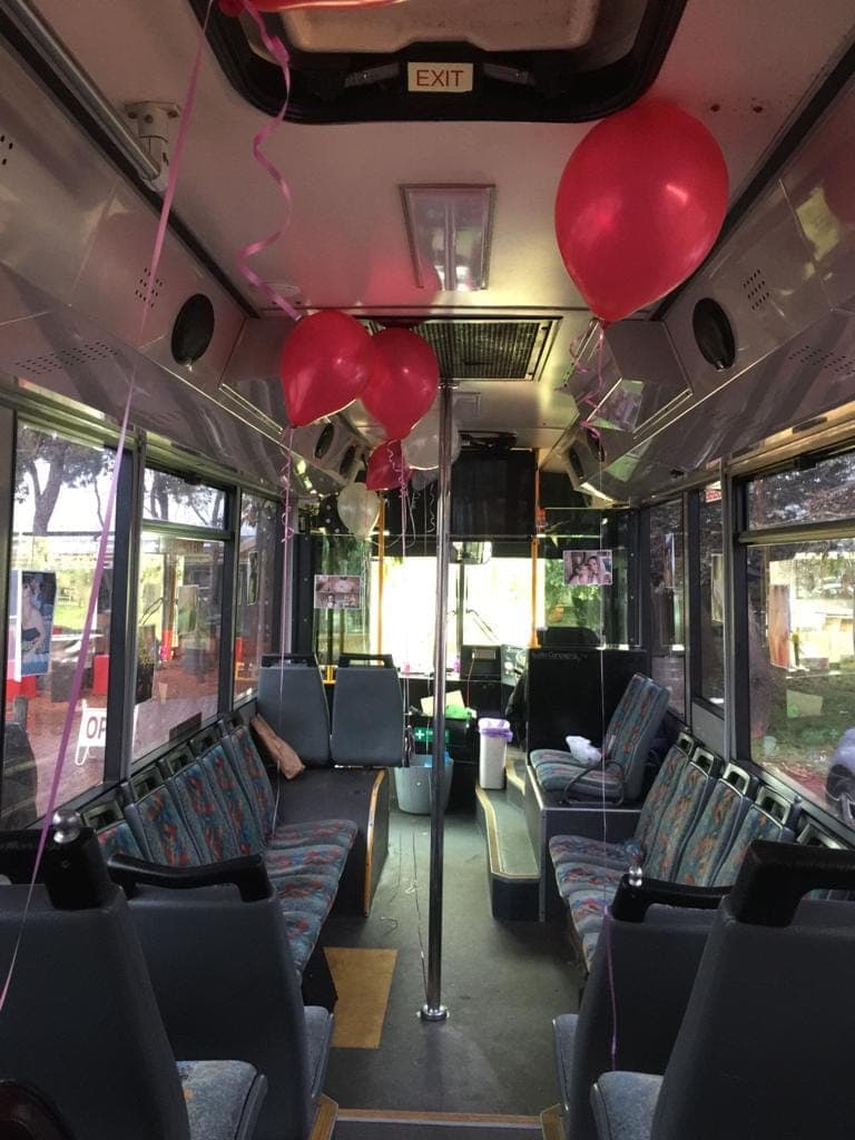 Interior of the 30 seater party bus set up for a birthday